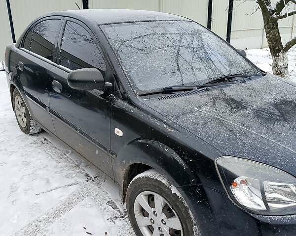 Черный Киа Рио, объемом двигателя 1.4 л и пробегом 100 тыс. км за 5800 $, фото 1 на Automoto.ua