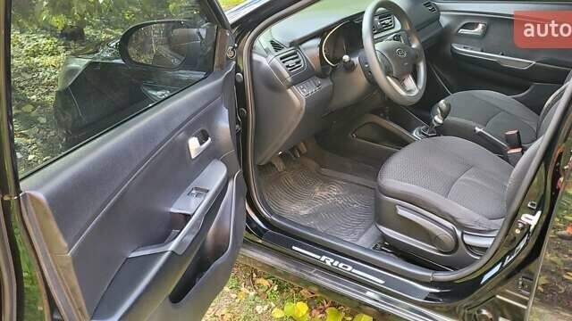 Черный Киа Рио, объемом двигателя 1.4 л и пробегом 120 тыс. км за 7200 $, фото 16 на Automoto.ua