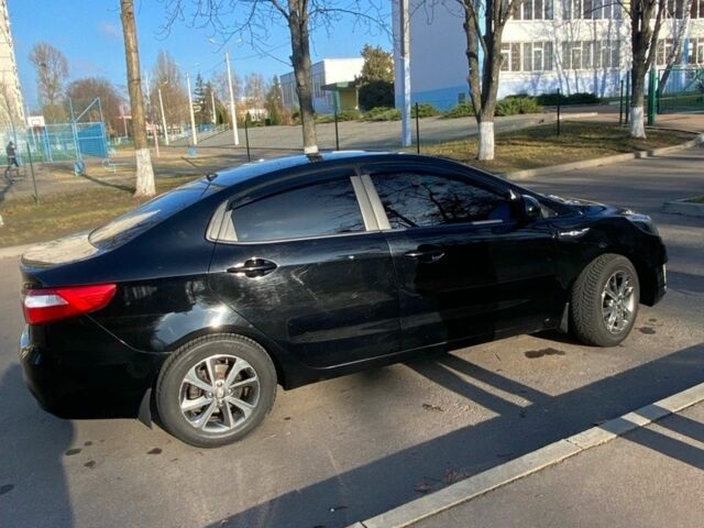 Черный Киа Рио, объемом двигателя 1.4 л и пробегом 135 тыс. км за 6700 $, фото 7 на Automoto.ua