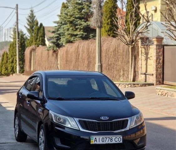 Черный Киа Рио, объемом двигателя 1.4 л и пробегом 180 тыс. км за 6500 $, фото 1 на Automoto.ua