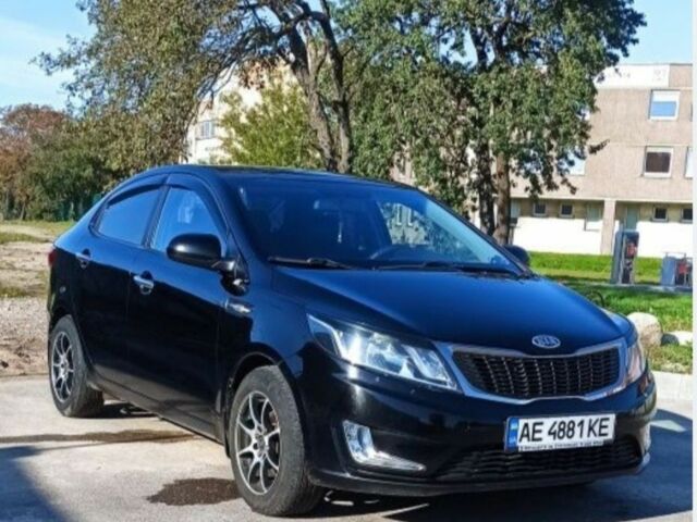 Чорний Кіа Ріо, об'ємом двигуна 1.4 л та пробігом 160 тис. км за 6900 $, фото 3 на Automoto.ua