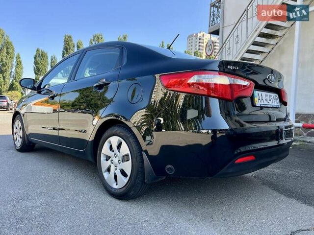 Чорний Кіа Ріо, об'ємом двигуна 1.4 л та пробігом 126 тис. км за 7900 $, фото 12 на Automoto.ua