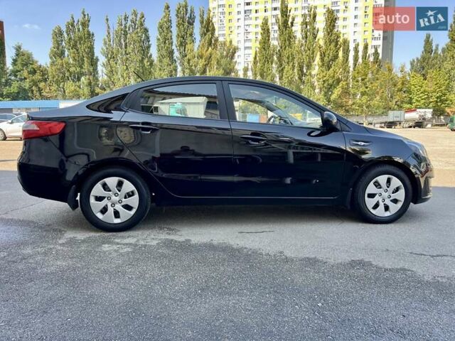 Чорний Кіа Ріо, об'ємом двигуна 1.4 л та пробігом 126 тис. км за 7900 $, фото 15 на Automoto.ua