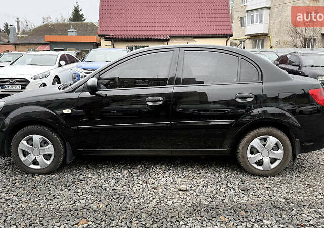 Черный Киа Рио, объемом двигателя 1.4 л и пробегом 100 тыс. км за 5000 $, фото 6 на Automoto.ua