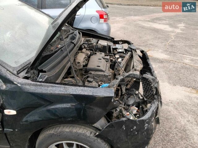 Чорний Кіа Ріо, об'ємом двигуна 1.4 л та пробігом 160 тис. км за 2600 $, фото 4 на Automoto.ua