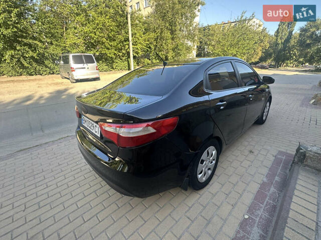 Черный Киа Рио, объемом двигателя 1.4 л и пробегом 182 тыс. км за 5800 $, фото 3 на Automoto.ua