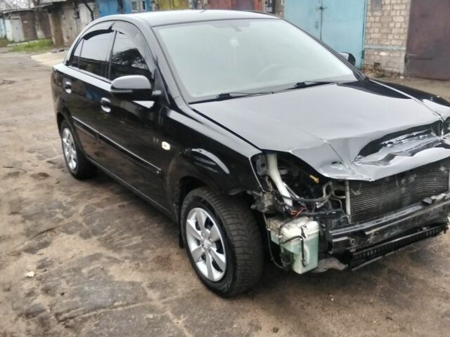 Черный Киа Рио, объемом двигателя 1.4 л и пробегом 150 тыс. км за 2550 $, фото 2 на Automoto.ua