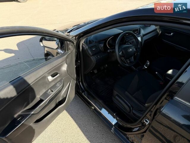 Черный Киа Рио, объемом двигателя 1.4 л и пробегом 162 тыс. км за 7700 $, фото 26 на Automoto.ua