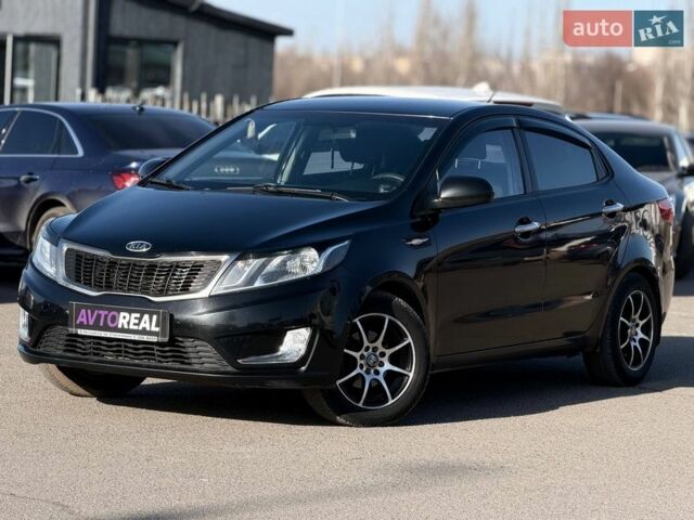 Черный Киа Рио, объемом двигателя 1.4 л и пробегом 162 тыс. км за 7700 $, фото 1 на Automoto.ua
