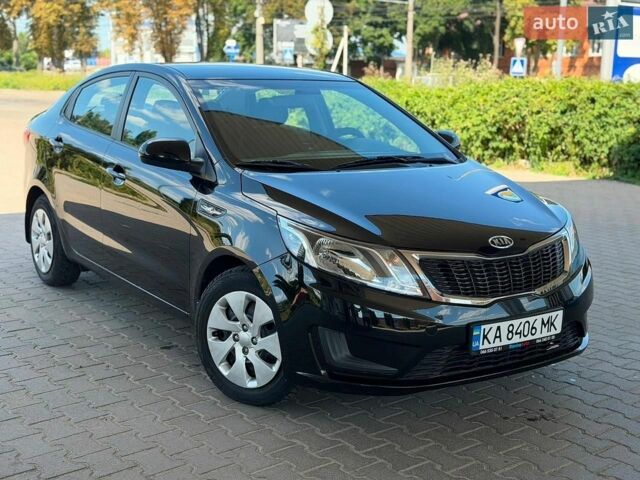Чорний Кіа Ріо, об'ємом двигуна 1.4 л та пробігом 65 тис. км за 8300 $, фото 14 на Automoto.ua