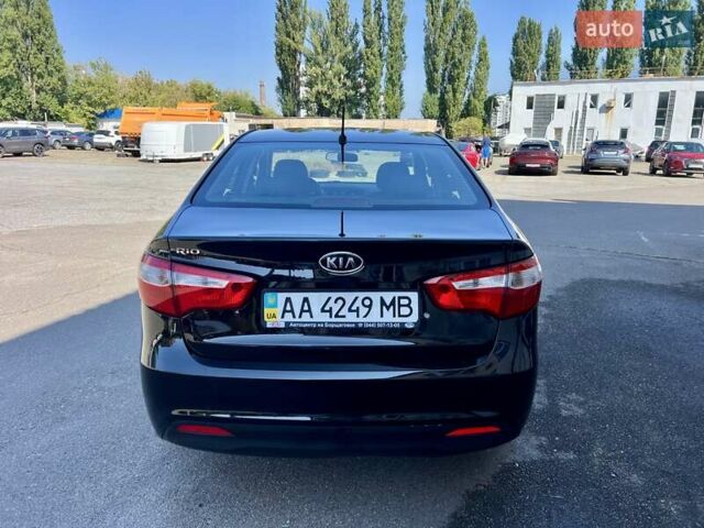 Чорний Кіа Ріо, об'ємом двигуна 1.4 л та пробігом 126 тис. км за 7900 $, фото 3 на Automoto.ua