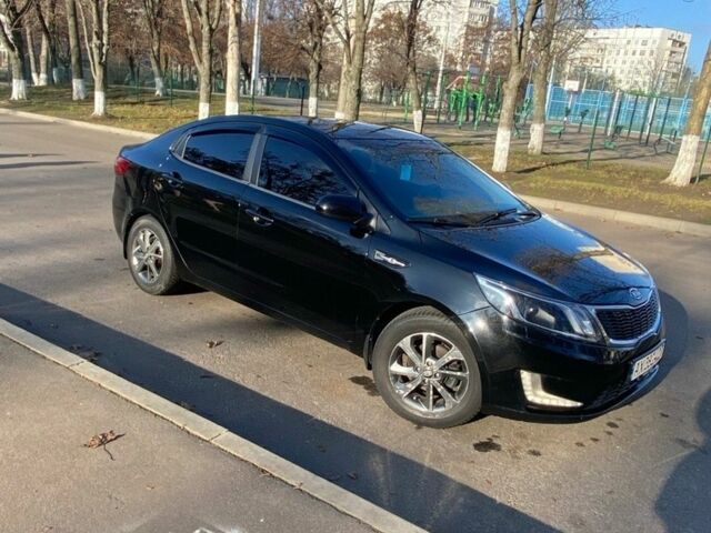 Черный Киа Рио, объемом двигателя 1.4 л и пробегом 135 тыс. км за 6700 $, фото 6 на Automoto.ua