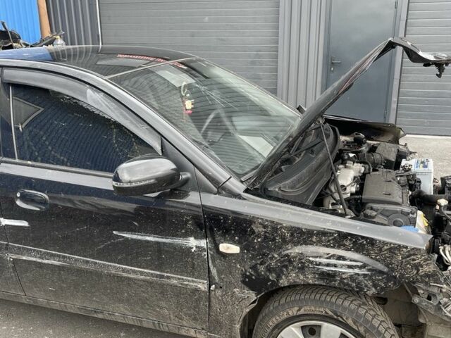 Черный Киа Рио, объемом двигателя 1.4 л и пробегом 150 тыс. км за 1800 $, фото 2 на Automoto.ua