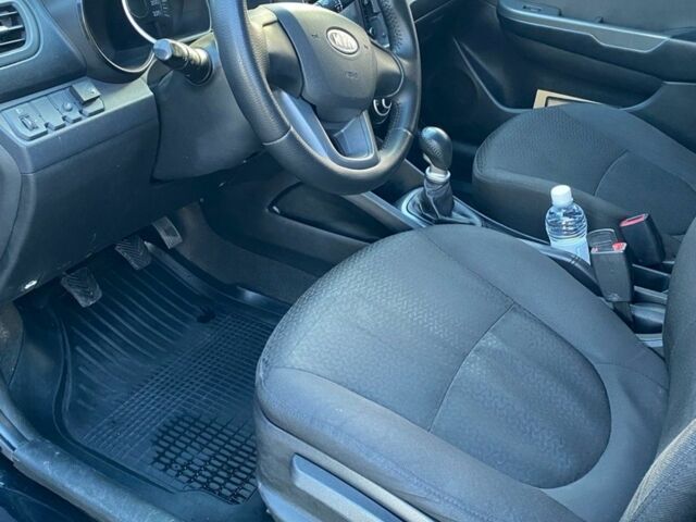 Черный Киа Рио, объемом двигателя 1.4 л и пробегом 135 тыс. км за 6700 $, фото 3 на Automoto.ua