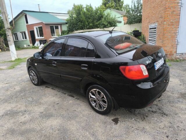 Черный Киа Рио, объемом двигателя 1.4 л и пробегом 137 тыс. км за 6300 $, фото 3 на Automoto.ua