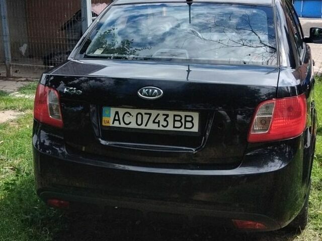 Чорний Кіа Ріо, об'ємом двигуна 1.4 л та пробігом 115 тис. км за 5600 $, фото 2 на Automoto.ua