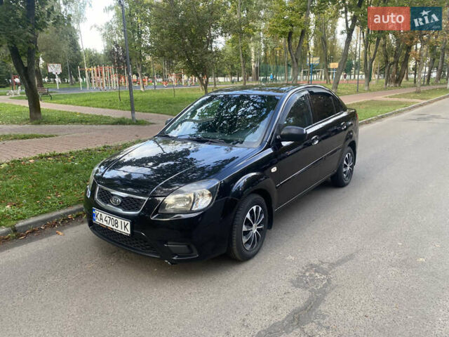 Черный Киа Рио, объемом двигателя 1.6 л и пробегом 125 тыс. км за 4950 $, фото 6 на Automoto.ua
