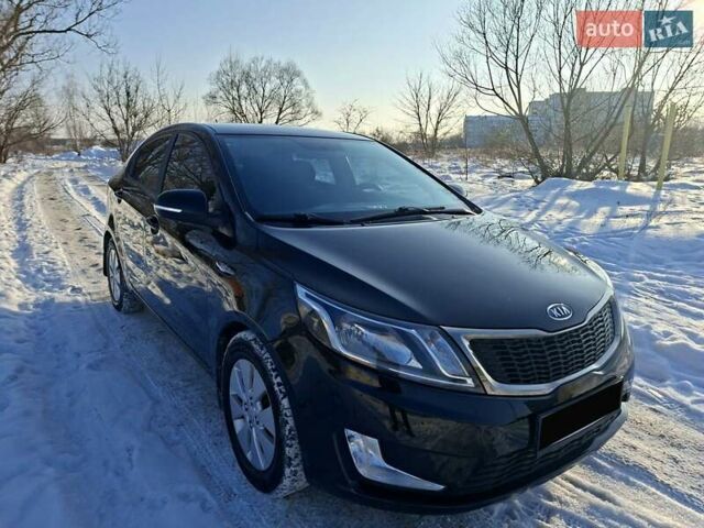 Черный Киа Рио, объемом двигателя 1.59 л и пробегом 231 тыс. км за 7100 $, фото 4 на Automoto.ua