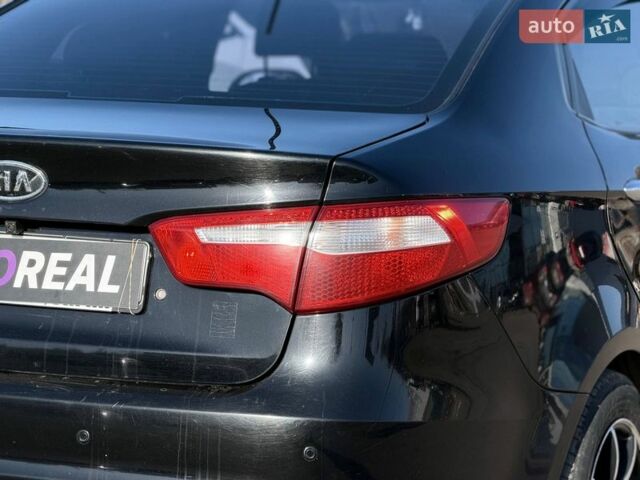 Черный Киа Рио, объемом двигателя 1.4 л и пробегом 162 тыс. км за 7700 $, фото 18 на Automoto.ua