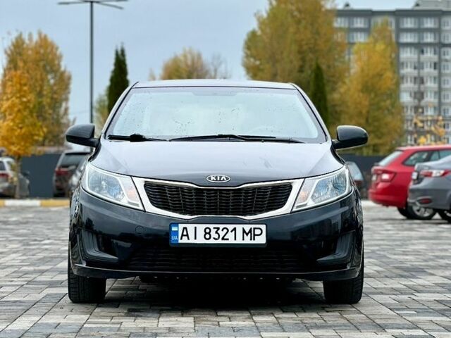 Черный Киа Рио, объемом двигателя 1.4 л и пробегом 180 тыс. км за 5900 $, фото 2 на Automoto.ua