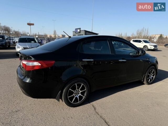 Черный Киа Рио, объемом двигателя 1.4 л и пробегом 162 тыс. км за 7700 $, фото 19 на Automoto.ua