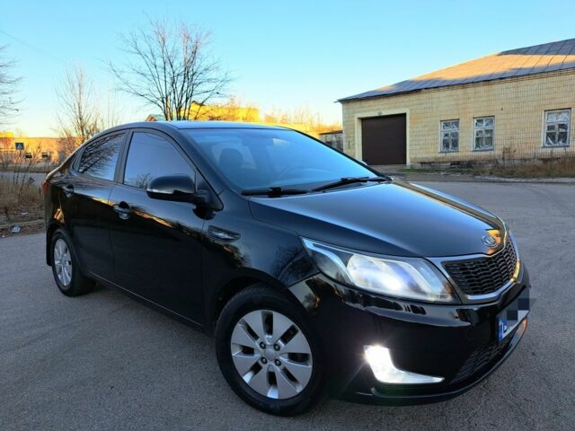 Черный Киа Рио, объемом двигателя 1.6 л и пробегом 231 тыс. км за 7600 $, фото 2 на Automoto.ua
