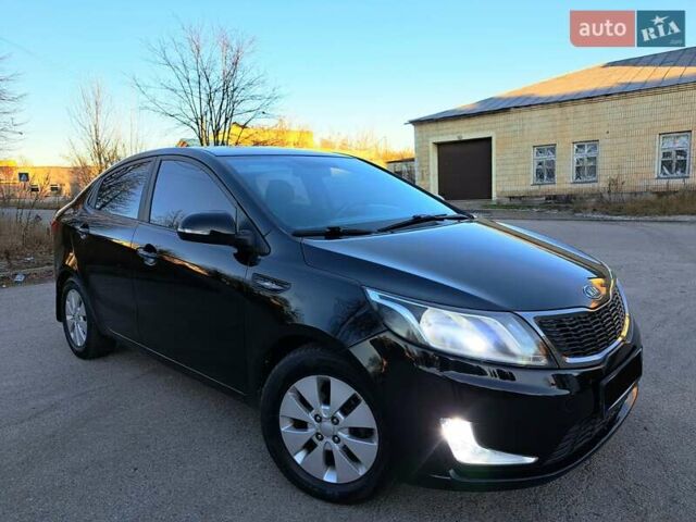Черный Киа Рио, объемом двигателя 1.59 л и пробегом 231 тыс. км за 7600 $, фото 1 на Automoto.ua