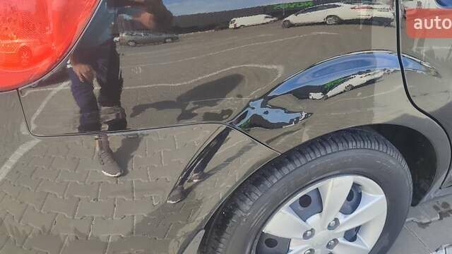 Черный Киа Рио, объемом двигателя 1.4 л и пробегом 224 тыс. км за 4600 $, фото 4 на Automoto.ua