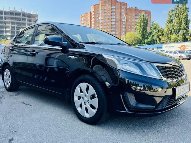 Чорний Кіа Ріо, об'ємом двигуна 1.4 л та пробігом 126 тис. км за 7900 $, фото 16 на Automoto.ua