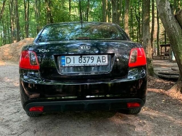Чорний Кіа Ріо, об'ємом двигуна 1.4 л та пробігом 275 тис. км за 4700 $, фото 2 на Automoto.ua