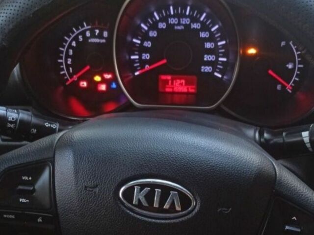 Чорний Кіа Ріо, об'ємом двигуна 1.4 л та пробігом 160 тис. км за 6900 $, фото 5 на Automoto.ua