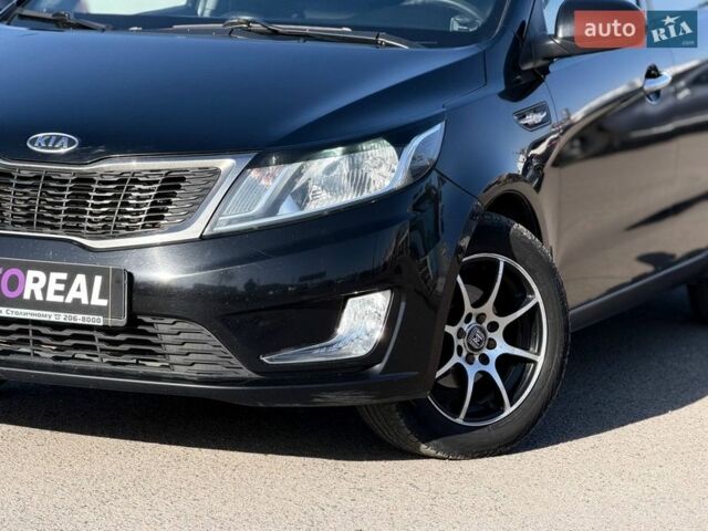 Черный Киа Рио, объемом двигателя 1.4 л и пробегом 162 тыс. км за 7700 $, фото 2 на Automoto.ua