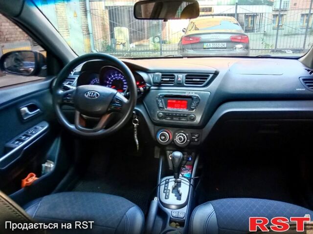 Чорний Кіа Ріо, об'ємом двигуна 1.6 л та пробігом 173 тис. км за 5800 $, фото 3 на Automoto.ua