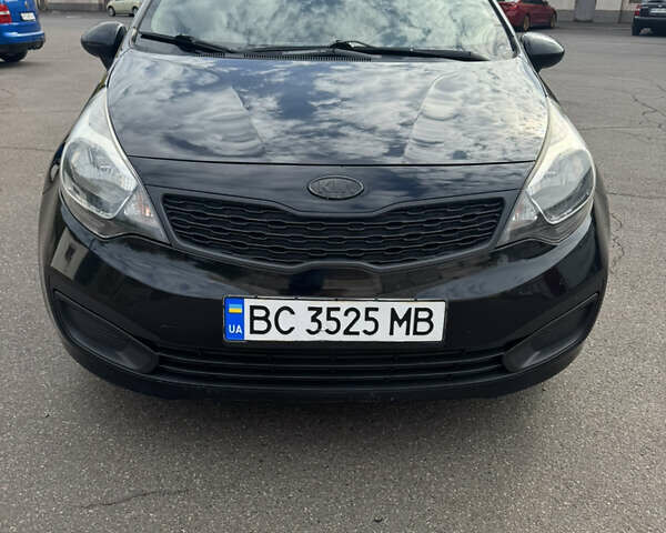 Черный Киа Рио, объемом двигателя 1.59 л и пробегом 220 тыс. км за 5500 $, фото 1 на Automoto.ua