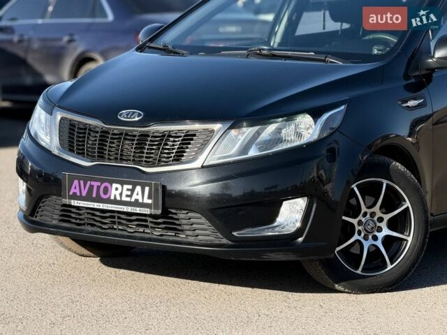 Черный Киа Рио, объемом двигателя 1.4 л и пробегом 162 тыс. км за 7700 $, фото 5 на Automoto.ua