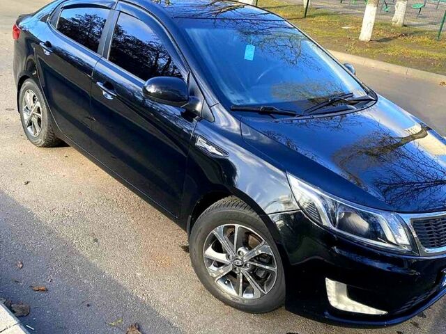 Черный Киа Рио, объемом двигателя 1.4 л и пробегом 1350 тыс. км за 7100 $, фото 5 на Automoto.ua
