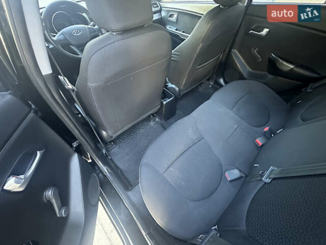 Черный Киа Рио, объемом двигателя 1.4 л и пробегом 182 тыс. км за 5800 $, фото 7 на Automoto.ua
