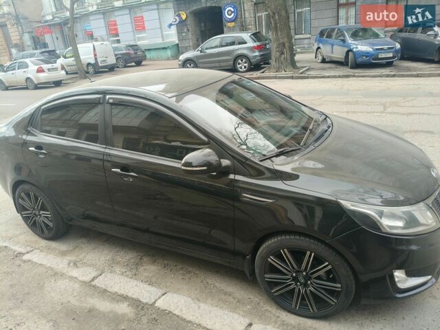 Черный Киа Рио, объемом двигателя 1.3 л и пробегом 120 тыс. км за 6850 $, фото 2 на Automoto.ua