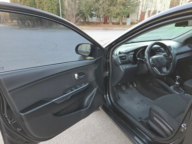 Черный Киа Рио, объемом двигателя 1.6 л и пробегом 231 тыс. км за 7600 $, фото 14 на Automoto.ua