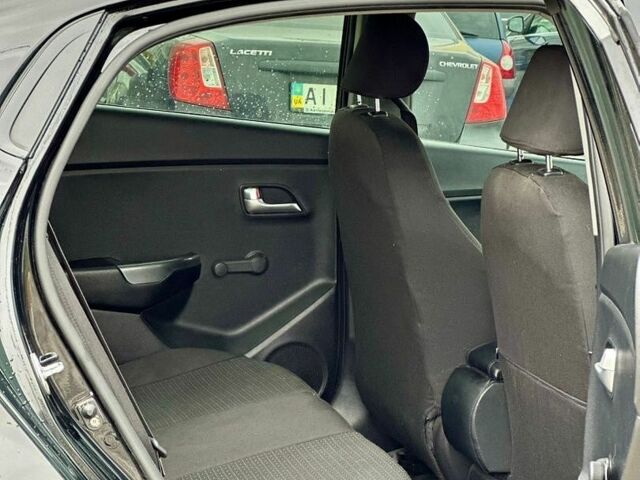 Черный Киа Рио, объемом двигателя 1.4 л и пробегом 180 тыс. км за 5900 $, фото 14 на Automoto.ua