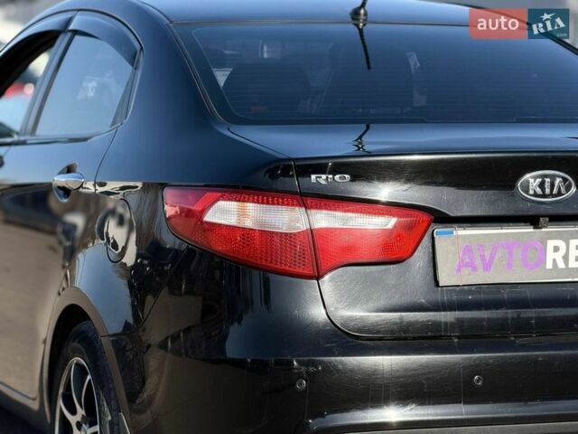 Черный Киа Рио, объемом двигателя 1.4 л и пробегом 162 тыс. км за 7700 $, фото 17 на Automoto.ua