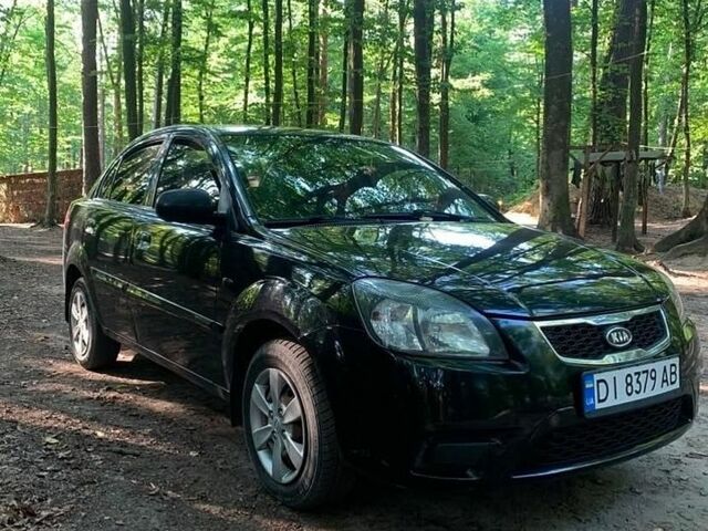 Чорний Кіа Ріо, об'ємом двигуна 1.4 л та пробігом 275 тис. км за 4700 $, фото 6 на Automoto.ua