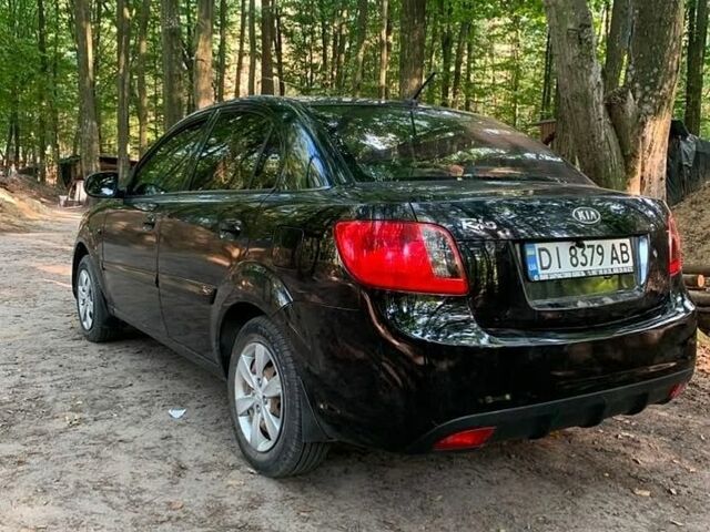 Чорний Кіа Ріо, об'ємом двигуна 1.4 л та пробігом 275 тис. км за 4700 $, фото 3 на Automoto.ua