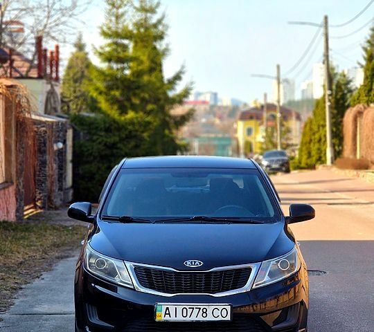 Чорний Кіа Ріо, об'ємом двигуна 1.4 л та пробігом 180 тис. км за 6500 $, фото 1 на Automoto.ua