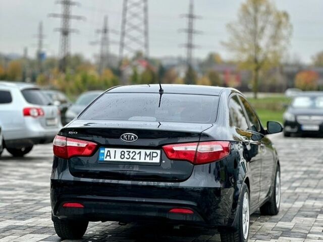 Черный Киа Рио, объемом двигателя 1.4 л и пробегом 180 тыс. км за 5900 $, фото 8 на Automoto.ua