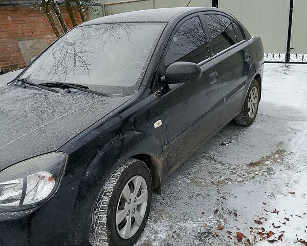Чорний Кіа Ріо, об'ємом двигуна 1.4 л та пробігом 100 тис. км за 5800 $, фото 6 на Automoto.ua
