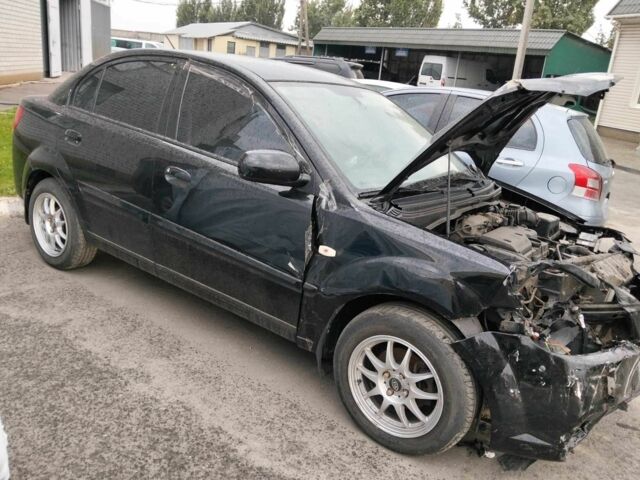 Чорний Кіа Ріо, об'ємом двигуна 1.4 л та пробігом 160 тис. км за 2343 $, фото 4 на Automoto.ua