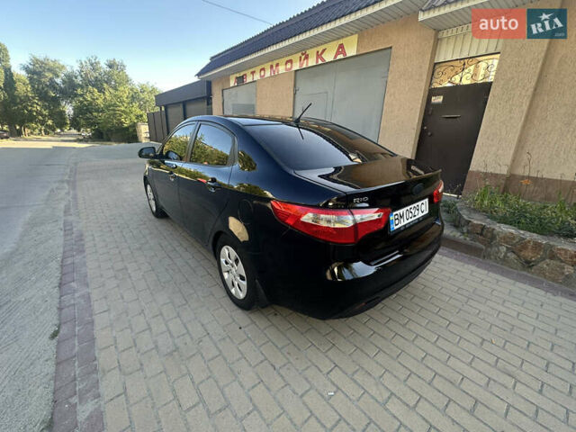 Черный Киа Рио, объемом двигателя 1.4 л и пробегом 182 тыс. км за 5800 $, фото 4 на Automoto.ua
