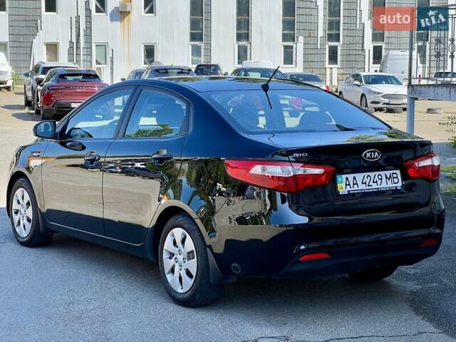 Чорний Кіа Ріо, об'ємом двигуна 1.4 л та пробігом 126 тис. км за 7900 $, фото 2 на Automoto.ua