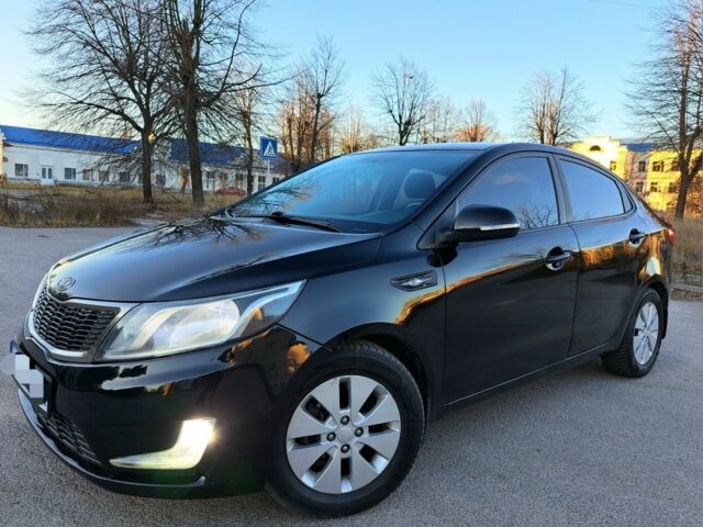 Черный Киа Рио, объемом двигателя 1.6 л и пробегом 231 тыс. км за 7600 $, фото 1 на Automoto.ua